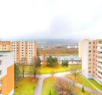 Apartment blocks on Považská Street in Nové Mesto nad Váhom surrounded by greenery.