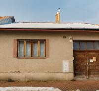 A family house on Garbiarska Street in Stará Ľubovňa with a snowy roof.