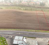 Aerial view of a commercial plot in Dudince, with the parcel marked by the main road.