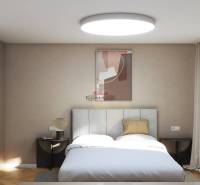 A bedroom in a family house with a bed, wardrobe, nightstands, and a floor with a wooden decor.