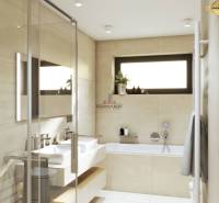 Bathroom in a family house with a bathtub, shower, and light tiles.
