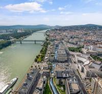 Aerial view of Bratislava across the river with a view of Pribinova and city architecture.