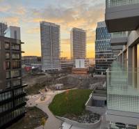 View from the balcony of a two-room apartment of the Bratislava skyline, Bottova Street at sunset.