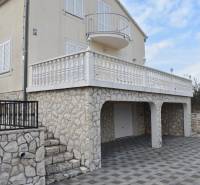A family house in the town of Pridraga with a stone facade and a spacious terrace.