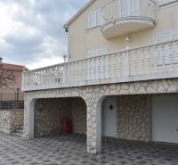 A family house in Pridraga with a stone facade, large terrace, and garage.
