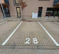 Parking space number 28 in front of the building in Senica.