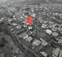 A top-down view of the layout of family houses in Nesluša with the designated area highlighted.