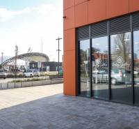 The exterior of commercial premises on Súkennícka Street in Bratislava - Ružinov with a glazed facade.