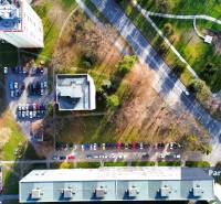 A view from above of parking between apartment buildings on Matice Slovenskej Street in Prešov.