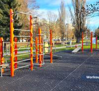 Workout playground on Matice Slovenskej Street in Prešov, with exercise equipment and trees.