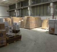 In the warehouse hall, there are pallets with cardboard boxes and packages of the Meditex brand.