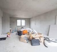 Renovated room in a family house with plastic pipes and boxes.