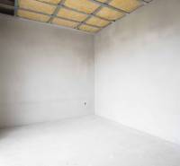 Empty room with gray walls and ceiling in a family house, unfurnished.