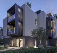 Exterior of a holiday apartment in the town of Hvar with a garden and terrace at sunset.