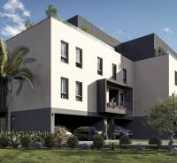 A recreational apartment in Hvar with modern architecture, surrounded by greenery and palm trees.