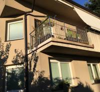 Family house on Mozartova Street in Bratislava - Staré Mesto with a balcony and a sunshade.