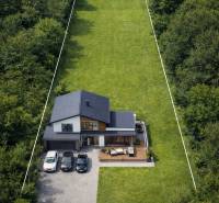 A family house surrounded by greenery in Podvysoká, ideal for residential plots.