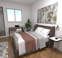 Bedroom in a family house with wood-patterned flooring, a bed, a lamp, and decoration.