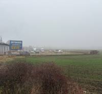 Fog over the lands on Bratislavská in Veľký Biel, next to the area with the sign Autonova.