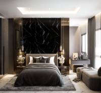 Luxury bedroom with dark walls and marble accents in a 2-room apartment.
