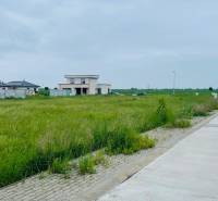 Plots - residential area in Podháj in Hviezdoslavov, with greenery and access road.