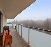 Balcony from a 3-room apartment on Bedlova Street, Bratislava - Karlova Ves with a foggy view.