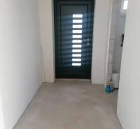 The entrance door in the family house with an empty space.