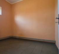 Security room with a window, radiator, and tiles. Warehouses and halls.