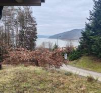 A view of the dam and greenery from the cottage on Main Street in Nova Kelc.