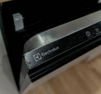 Detail of an Electrolux appliance in a 3-room apartment with wood-patterned flooring.