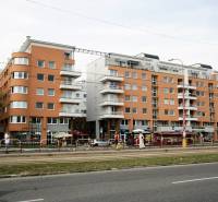 Residential and commercial premises on Komárnická Street, Bratislava - Ružinov, with a tram line.