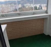 A glazed balcony with a view of Čadca, part of a 3-room apartment.