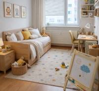Children's room with wood-patterned flooring, a bed, play toys, and a drawing board.