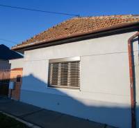 A family house on Pod kopcom Street in Nové Zámky with shutters and a sloped roof.