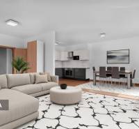 Living area in a 3-room apartment with a comfortable sofa and a kitchen with a wooden decor floor.