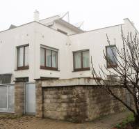Family house on Súľovská Street, Bratislava - Ružinov with a driveway and a brick fence.