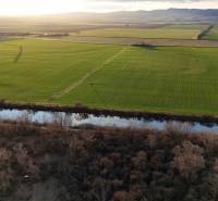 Meadows and river at dusk near Nová Ves nad Váhom, recreational grounds.