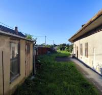 Two older houses with a yard in the background, Reca, Residential plots.
