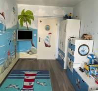 Children's room with a nautical theme, wooden decor flooring, furnishings for a 4-room apartment.