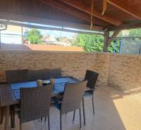 A terrace at a family house in Čierny Brod with seating made of synthetic rattan.