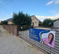 Family house for sale in Čierny Brod, with a large yard enclosed by a fence.