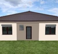 A family house in Kolónia, Galanta, with a dark roof and a grassy garden.