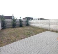 Paved area and fenced garden at a 2-room apartment in Galanta.