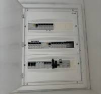 Electrical distribution box in a family house with circuit breakers and labeling on the description strip.