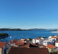 Sea view and rooftops of a Holiday Apartment in the town of Ciovo on a sunny day.