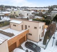A snow-covered family house on Konopiská Street in Bratislava-Čunovo.