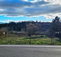 Land for residential use in Čifáre, on Čifáre street, surrounded by nature and trees.