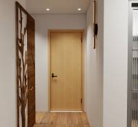 A hallway in a 3-room apartment with a wooden decor and interesting glass doors.