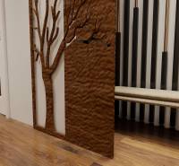 Interior of a 3-room apartment with wood decor and a metal tree element on the wall.
