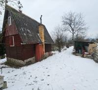 Cottage in Dubnica nad Váhom in Lieskovec in a winter setting with snow.